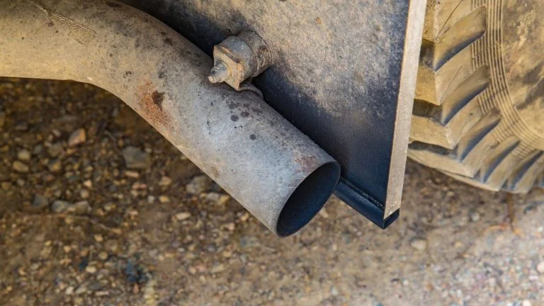 Dirty exhaust of car