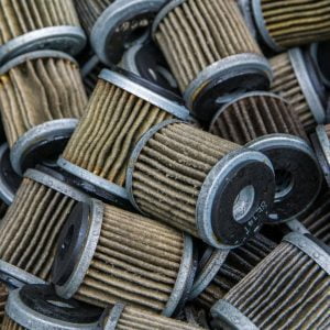 What are the symptoms of a clogged oil filter?